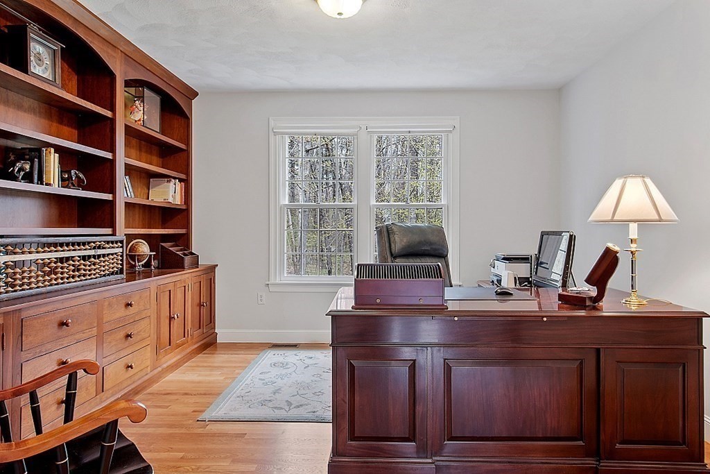 195 Lancaster Road North Andover, MA 01845 - Photo 12 of 42 a view of a workspace with furniture and a window