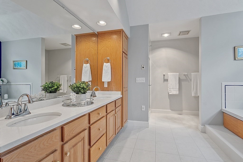 195 Lancaster Road North Andover, MA 01845 - Photo 20 of 42 a bathroom with a double vanity sink and a mirror