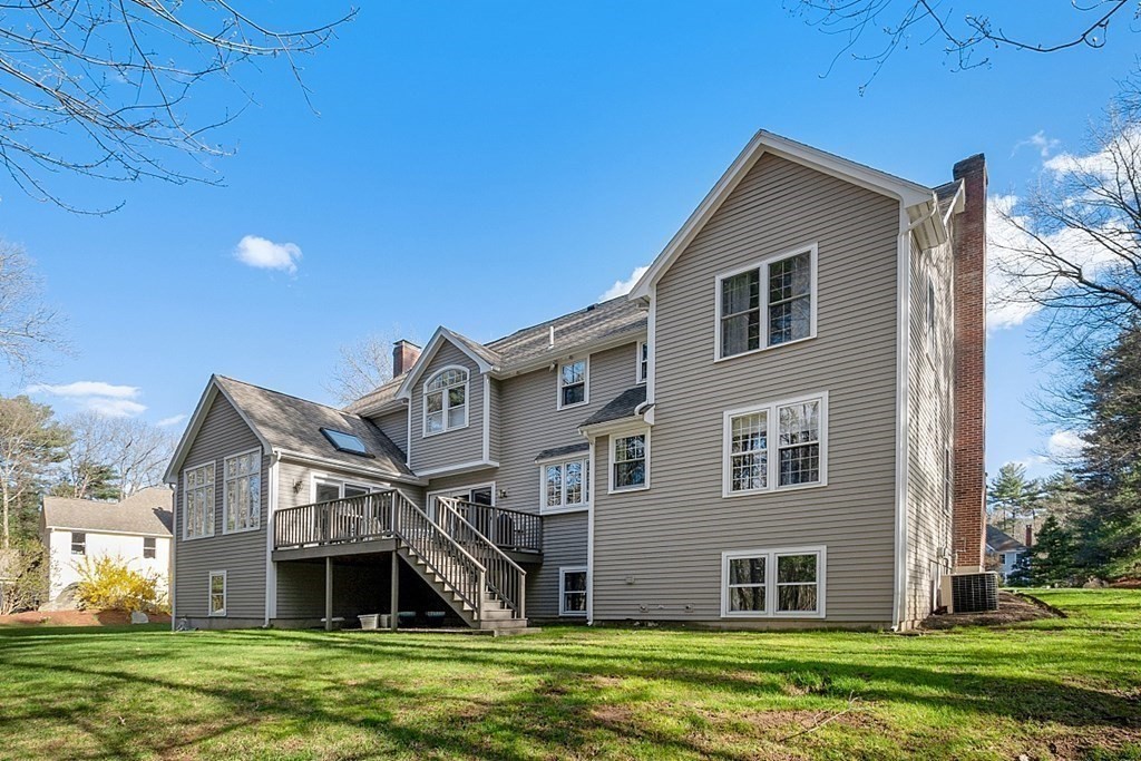 195 Lancaster Road North Andover, MA 01845 - Photo 36 of 42 a front view of house with yard and green space