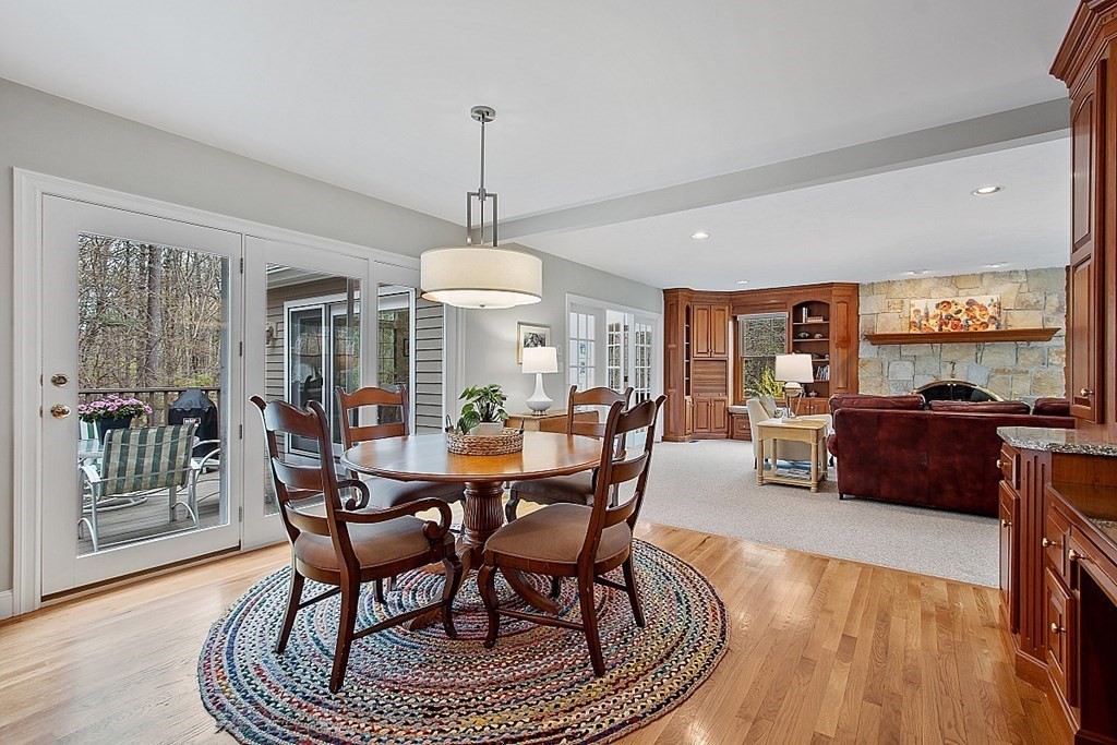 195 Lancaster Road North Andover, MA 01845 - Photo 4 of 42 a view of a dining room with furniture window and wooden floor