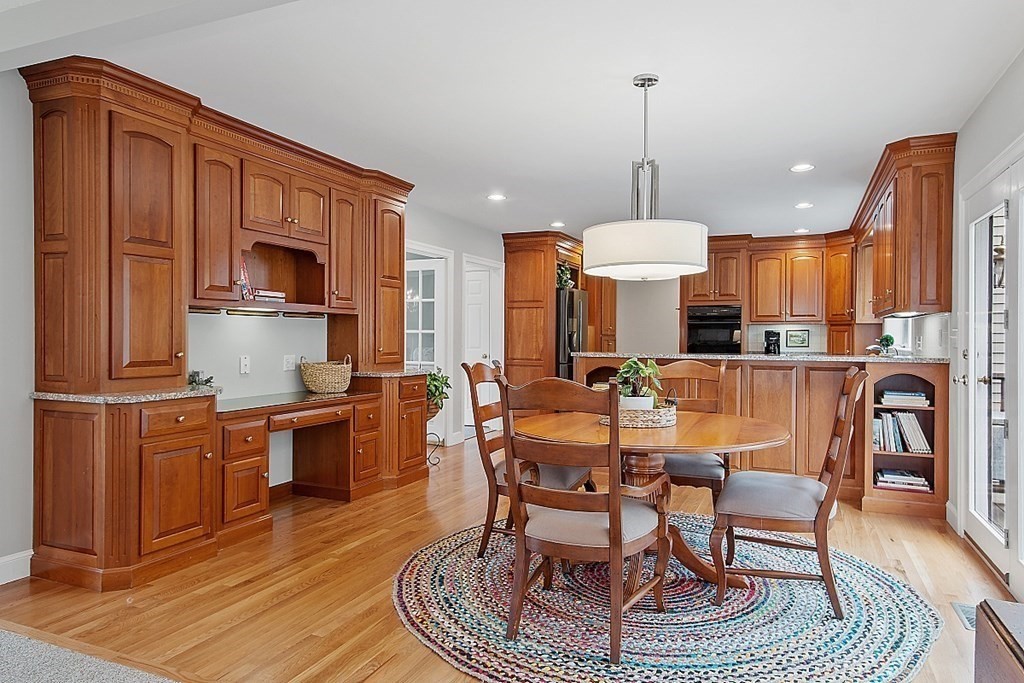 195 Lancaster Road North Andover, MA 01845 - Photo 7 of 42 a view of a dining room with furniture kitchen and wooden floor