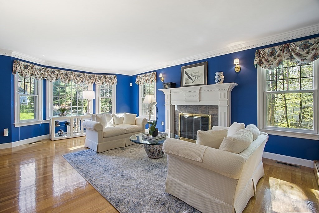 195 Lancaster Road North Andover, MA 01845 - Photo 10 of 42 a living room with furniture and a fireplace