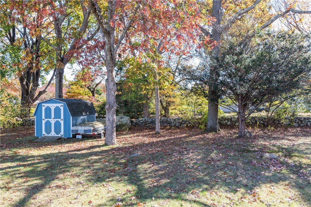 20 South Drive Westerly, RI 02891 - Photo 24 of 26 Great shed. Stone wall at rear of lot