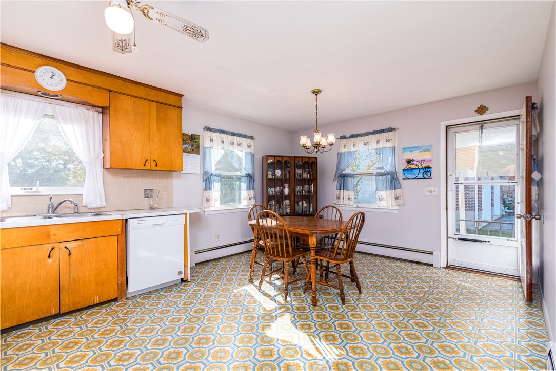 20 South Drive Westerly, RI 02891 - Photo 9 of 26 Diningf area adjacent to kitchen. Door leads to carport