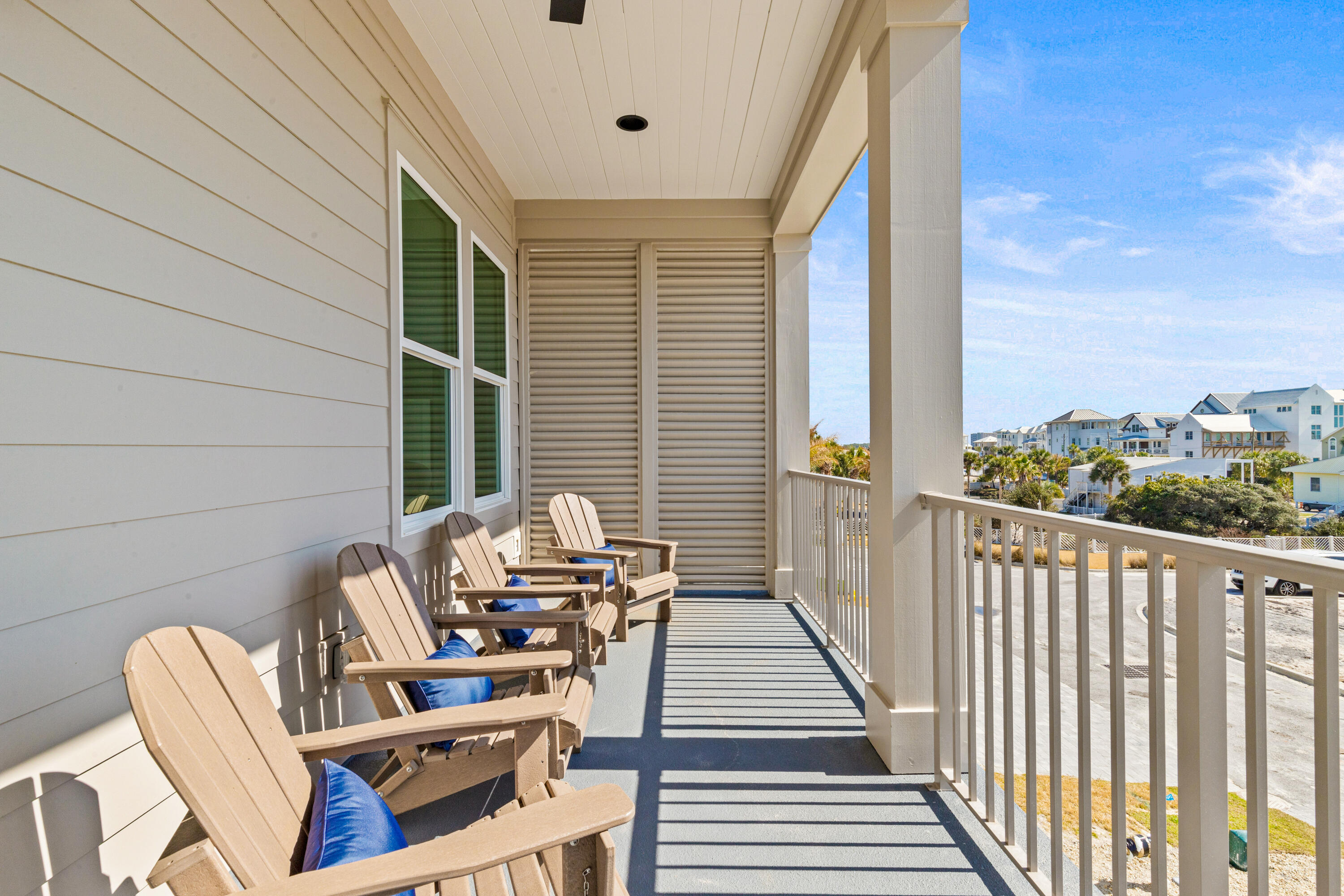 12 Jan Court Inlet Beach, FL 32461 - Photo 18 of 58 a view of balcony with wooden floor and outdoor seating