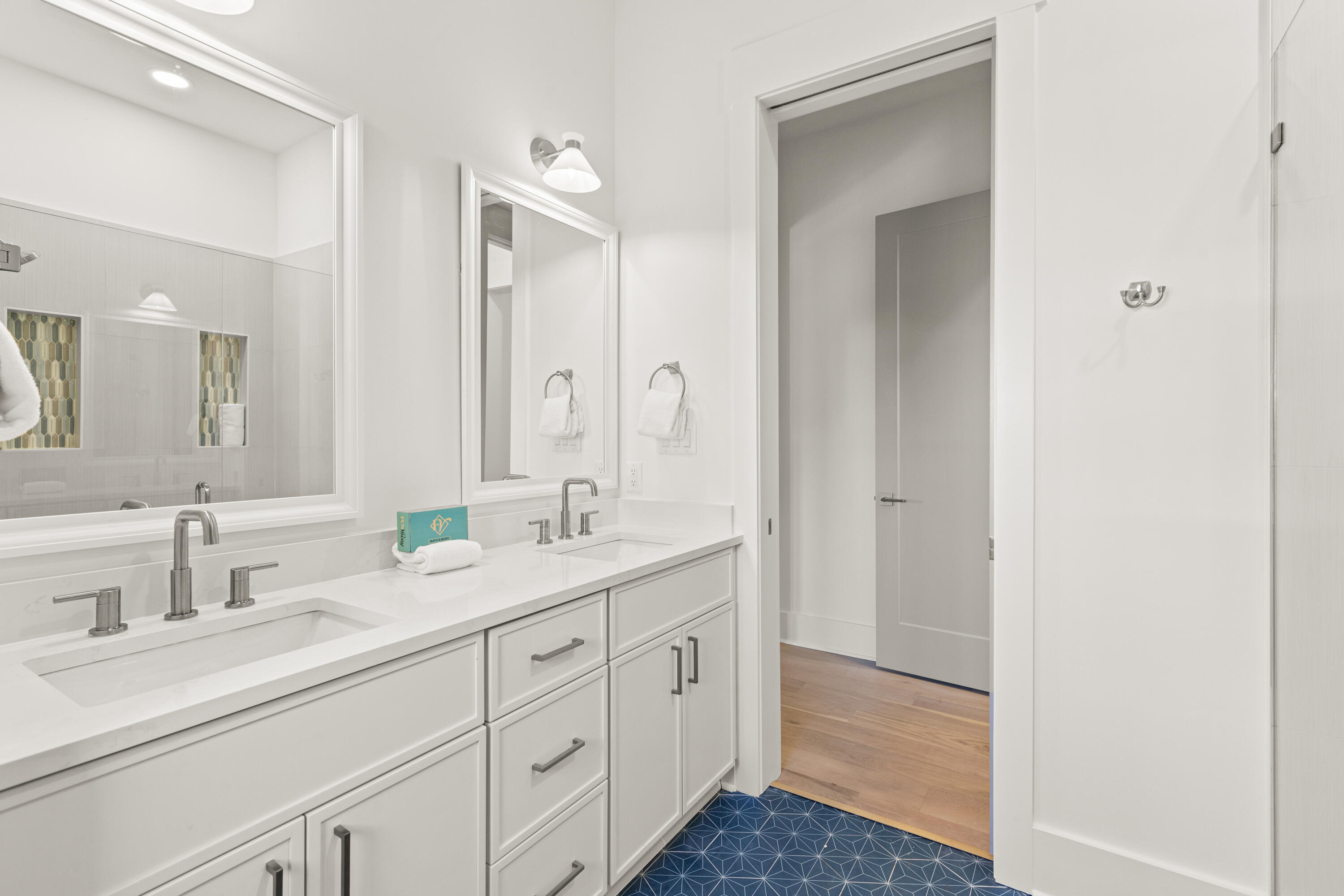 12 Jan Court Inlet Beach, FL 32461 - Photo 30 of 58 a spacious bathroom with a double vanity sink double and mirror