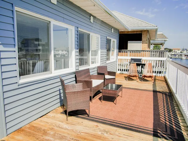 a building outdoor space with patio furniture