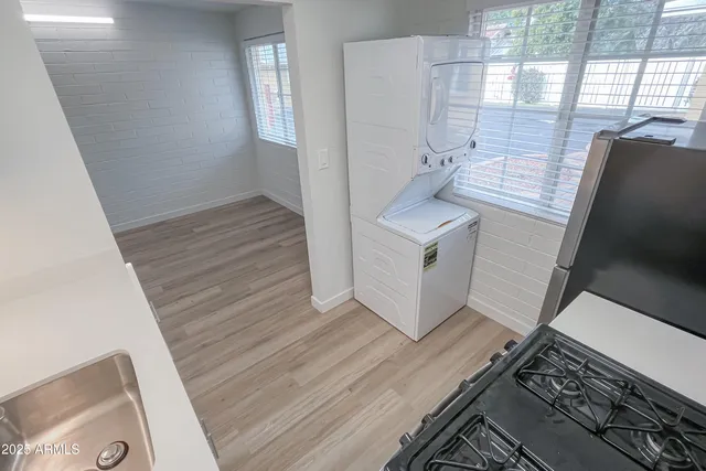 a view of kitchen and utility room