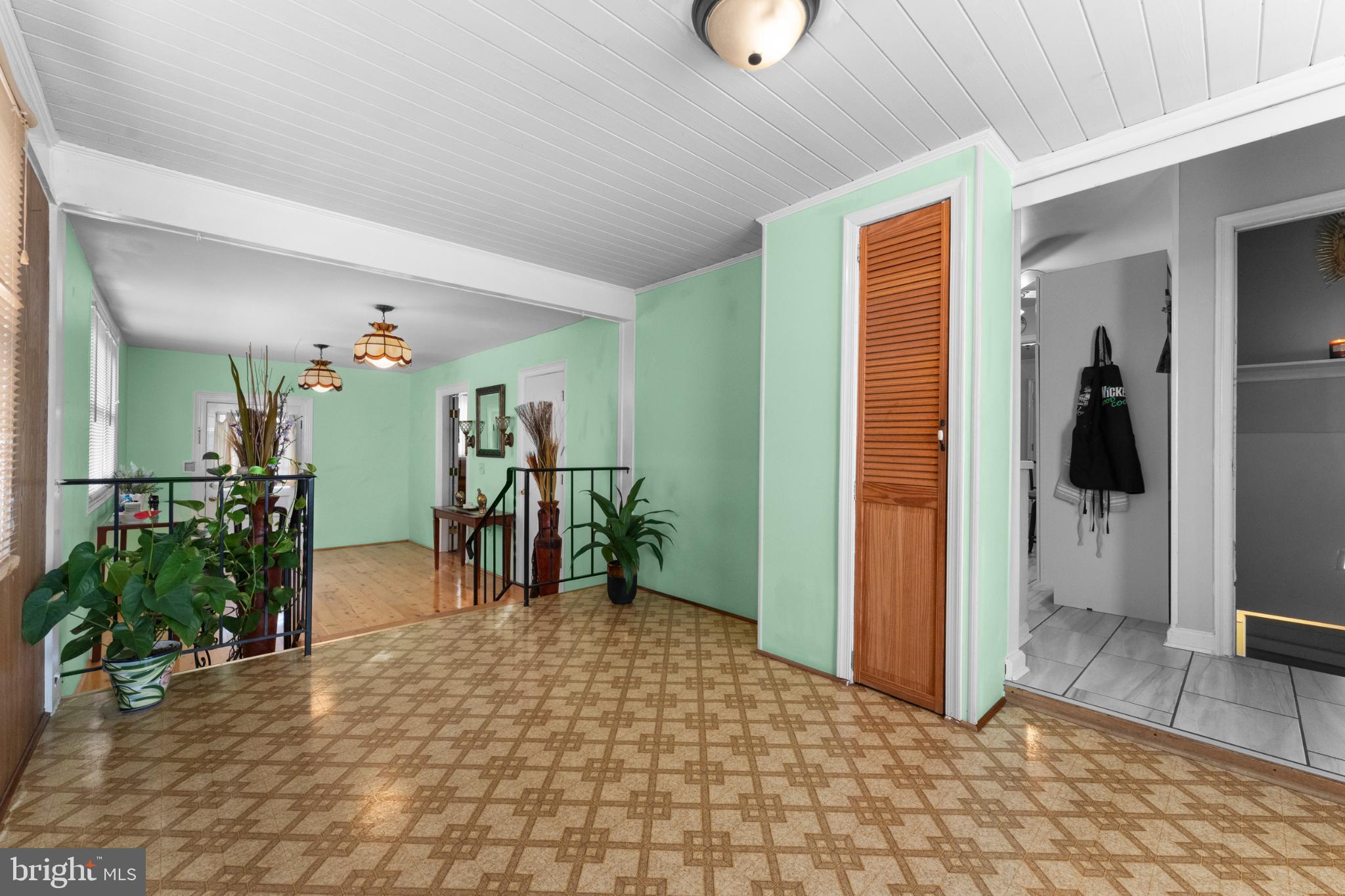 2116 Orange Road Culpeper, VA 22701 - Photo 11 of 27 Inviting entryway with vibrant green hues.