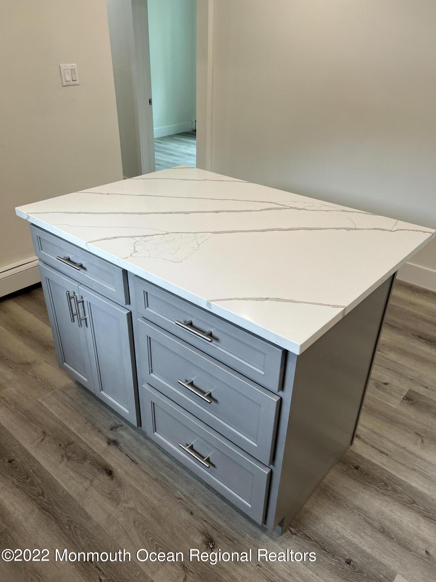 33 Lower Main Street, Unit LOWER LEVEL Matawan, NJ 07747 - Photo 7 of 25 CENTER ISLAND