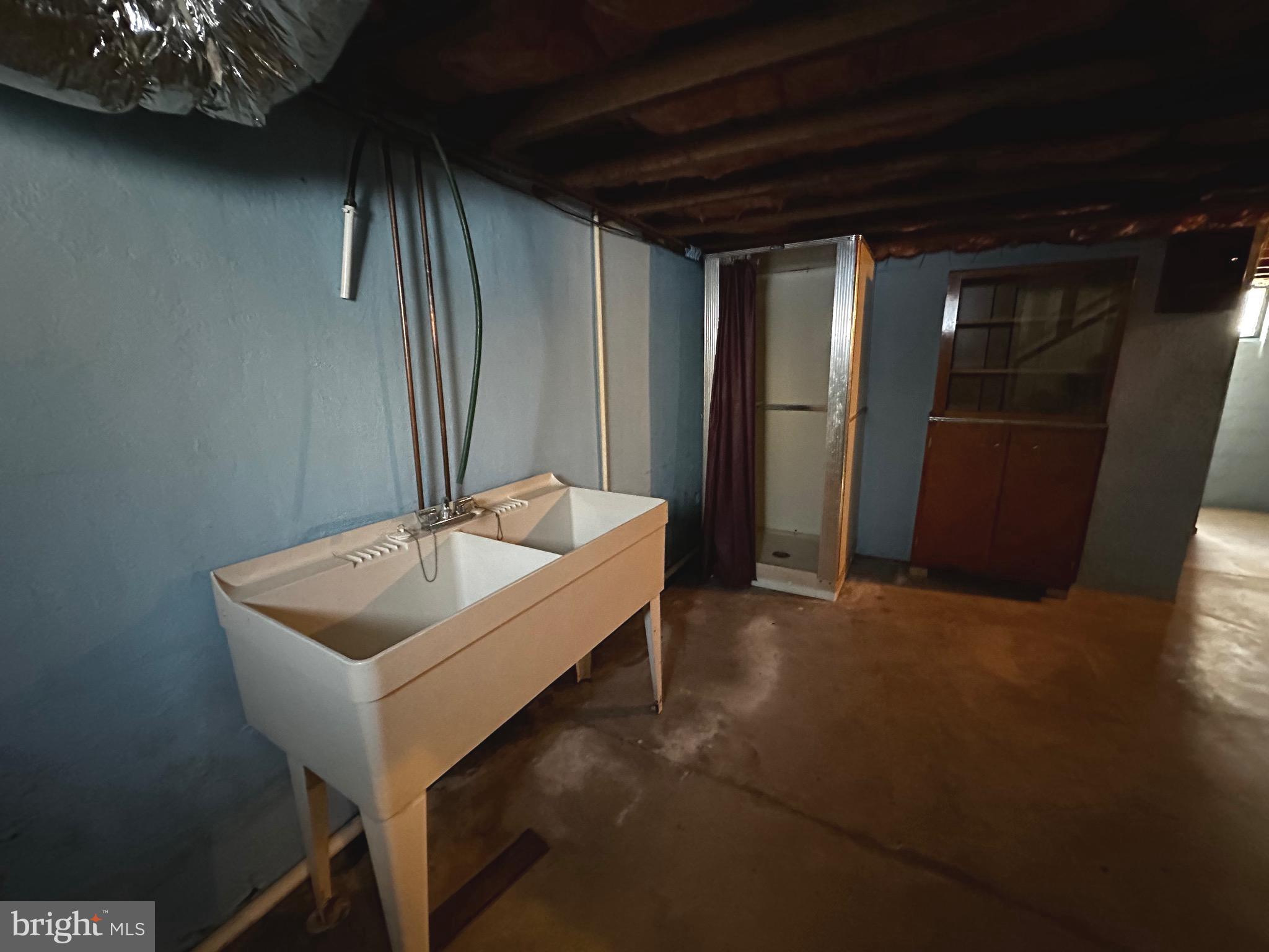 3500 Paw Paw Road Paw Paw, WV 25434 - Photo 39 of 48 a bathroom with a sink and mirror