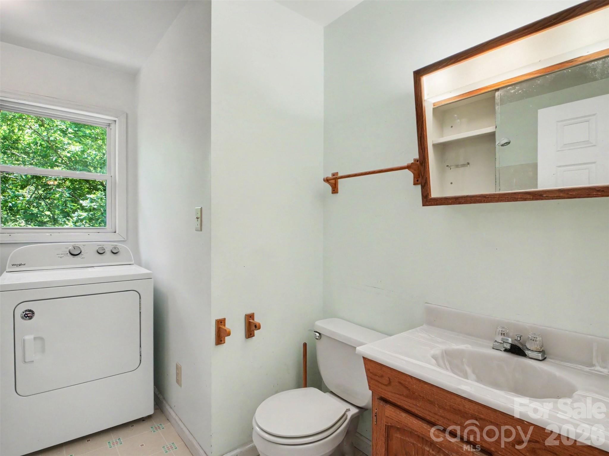 11109 Asbury Chapel Road Huntersville, NC 28078 - Photo 18 of 33 a bathroom with a sink toilet and vanity