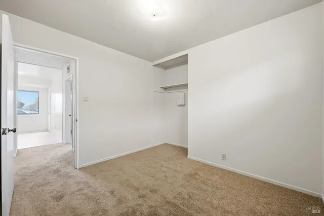 an empty room with an entryway