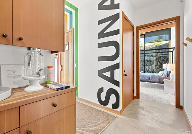 a view of a room that has a washer and dryer