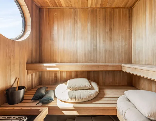 a room with a table and chairs