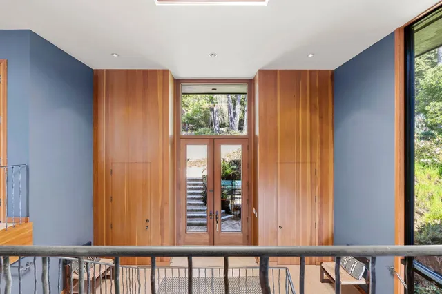 a view of a porch with wooden floor
