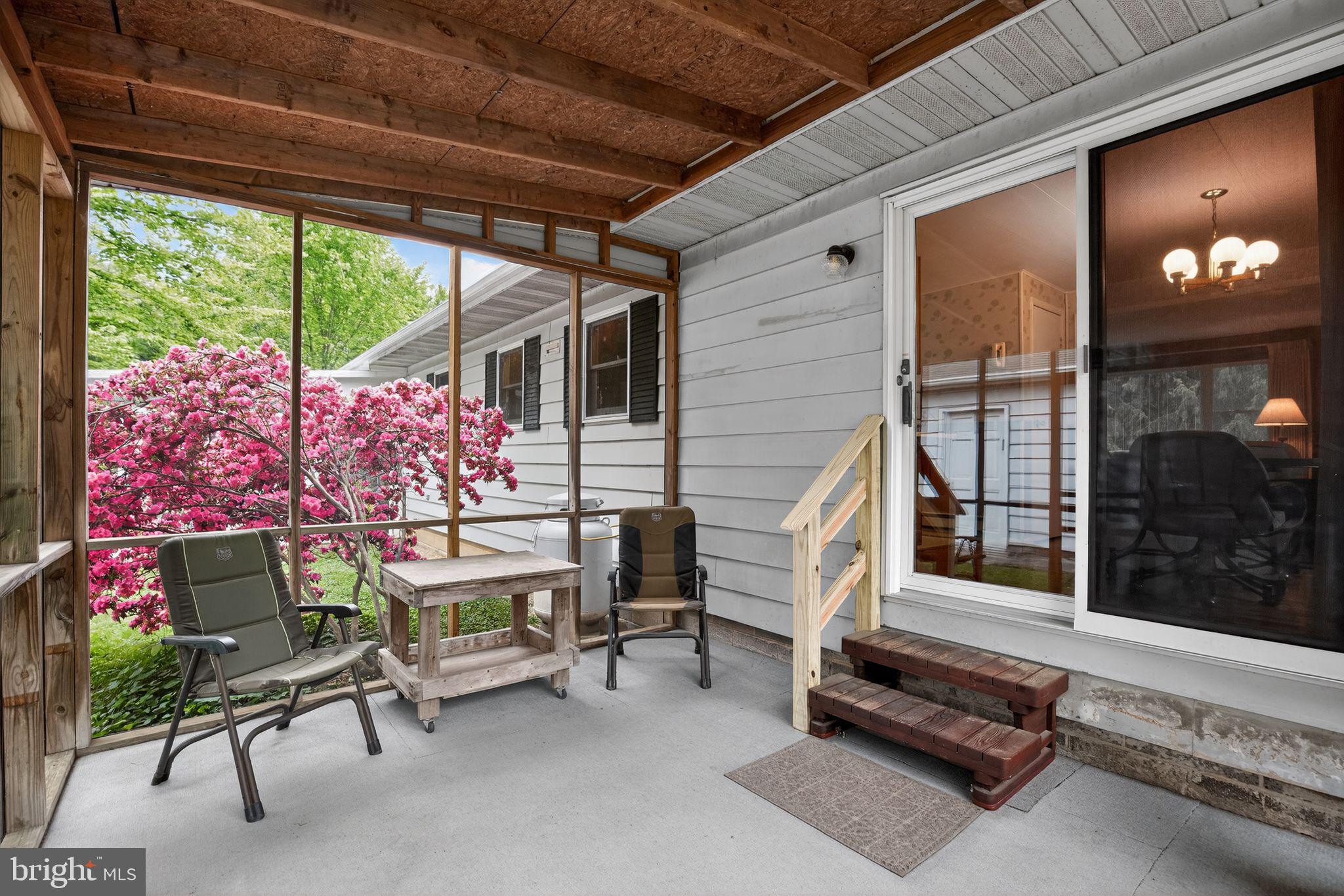 6070 Hill Road St. Leonard, MD 20685 - Photo 26 of 38 Screened Porch off Dining Room