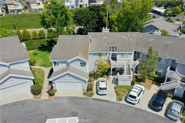 an aerial view of a house with garden