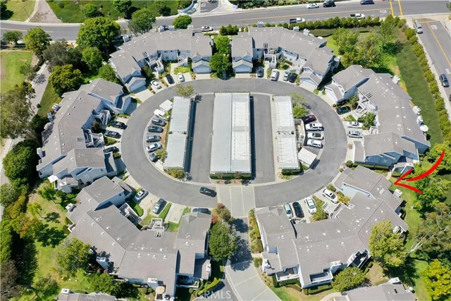 an aerial view of a house with outdoor space