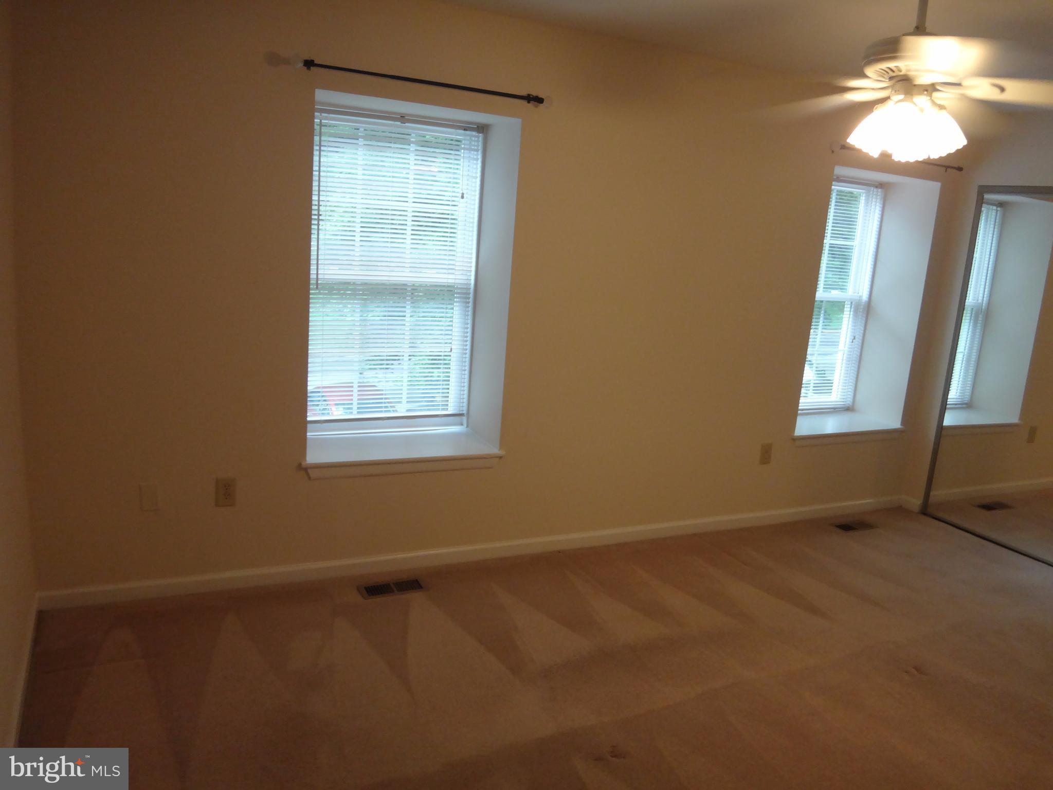 6446 Shannon Station Court Springfield, VA 22152 - Photo 11 of 25 a view of an empty room with a window