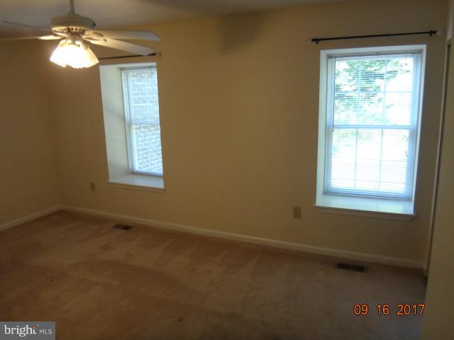 6446 Shannon Station Court Springfield, VA 22152 - Photo 14 of 25 a view of an empty room with a window