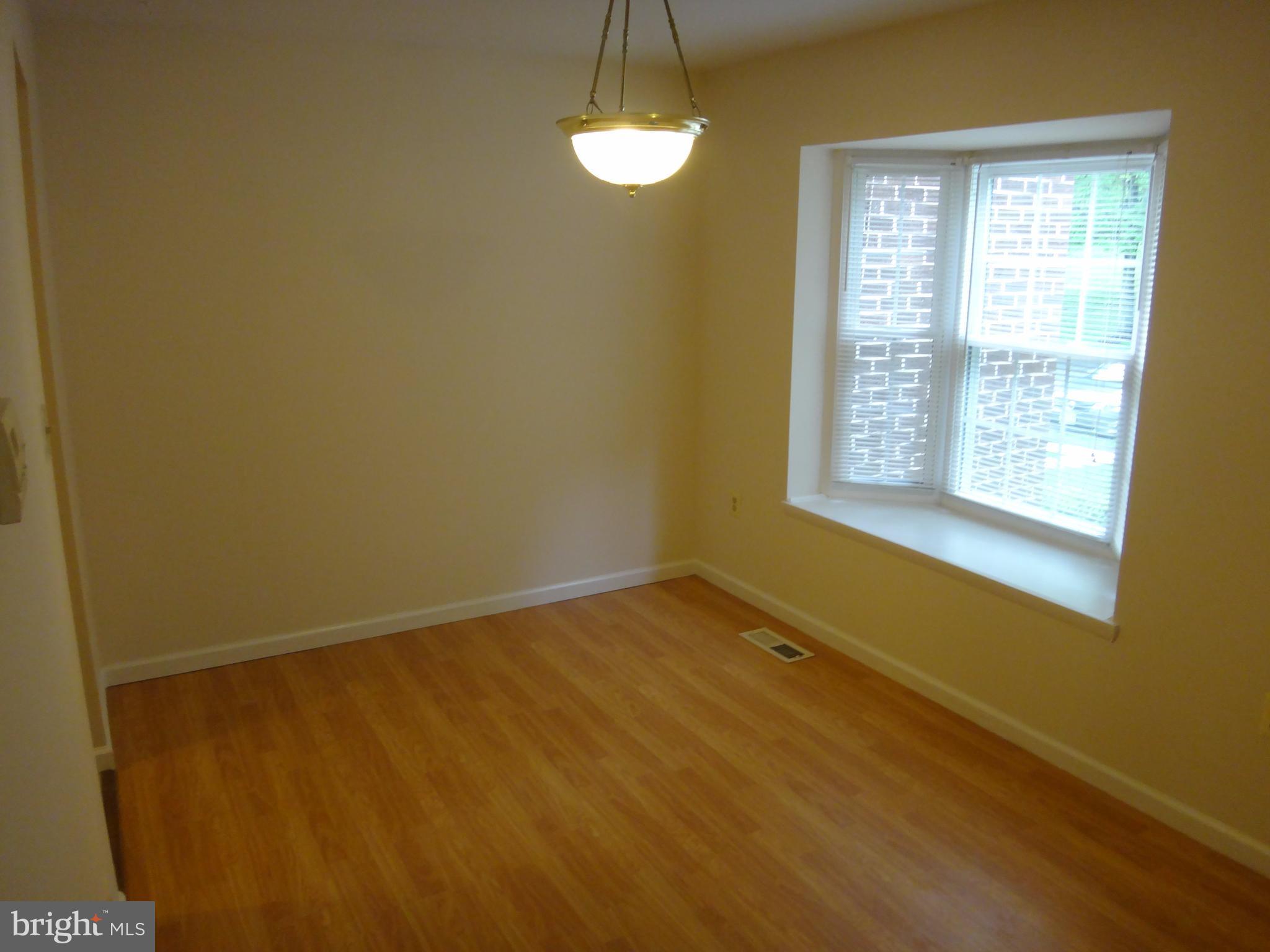 6446 Shannon Station Court Springfield, VA 22152 - Photo 18 of 25 a view of an empty room with a window