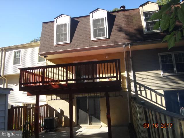 6446 Shannon Station Court Springfield, VA 22152 - Photo 22 of 25 a view of a house with a deck