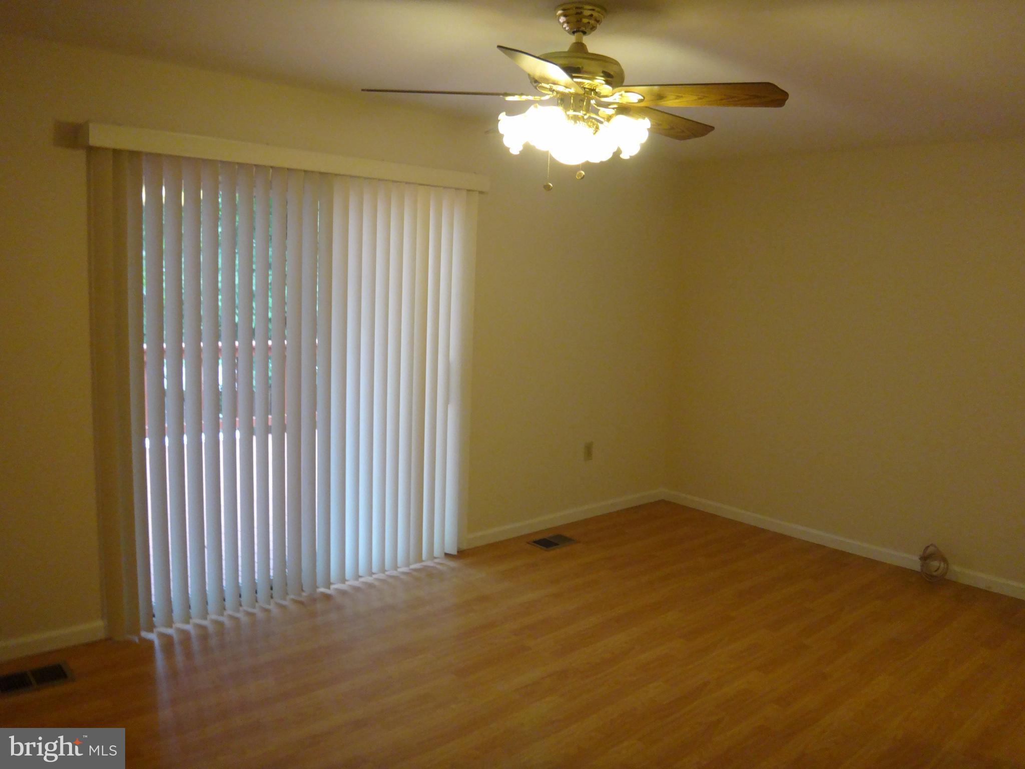 6446 Shannon Station Court Springfield, VA 22152 - Photo 6 of 25 an empty room with a window