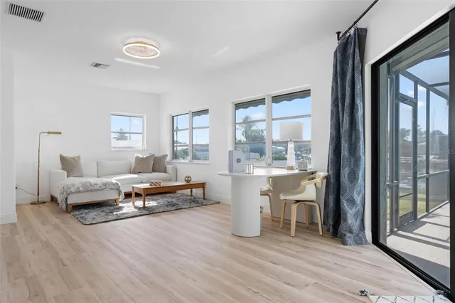 an aerial view of a house with a ocean view