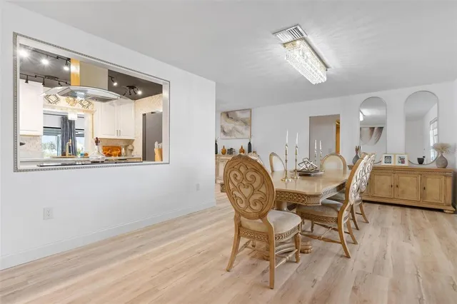 a bedroom with a bed and a table in it