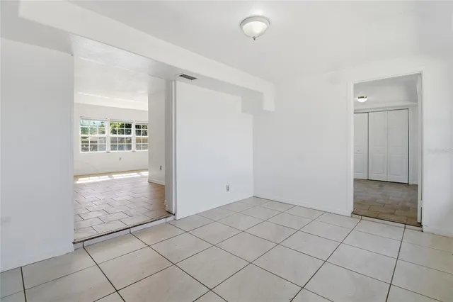 a view of an empty room and window