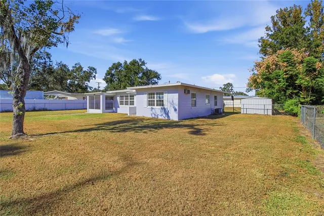 a view of a house with swimming pool
