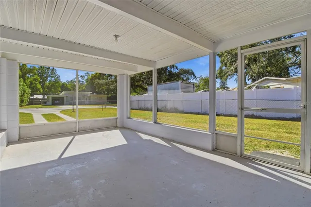 wooden view of an empty room with a swimming pool