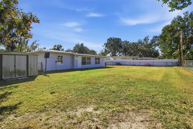 a view of a house with a swimming pool