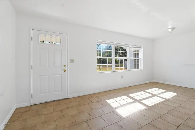 a view of an empty room with window