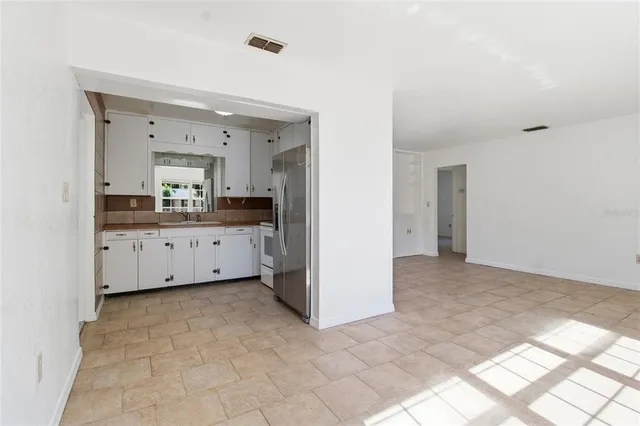 a view of a kitchen with a sink