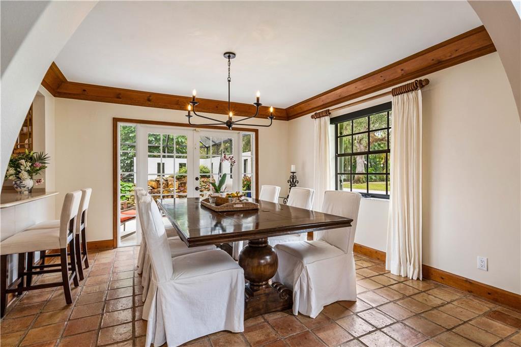 246 Live Oak Road Vero Beach, FL 32963 - Photo 12 of 30 a dining room with furniture and window