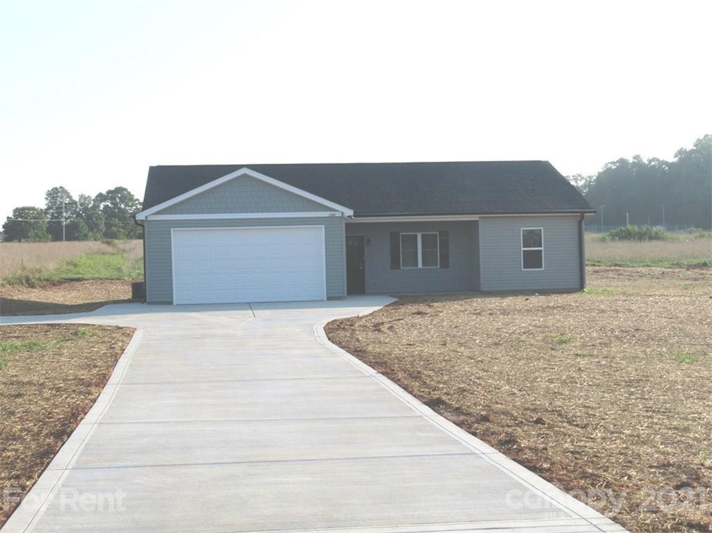 a house view with a outdoor space