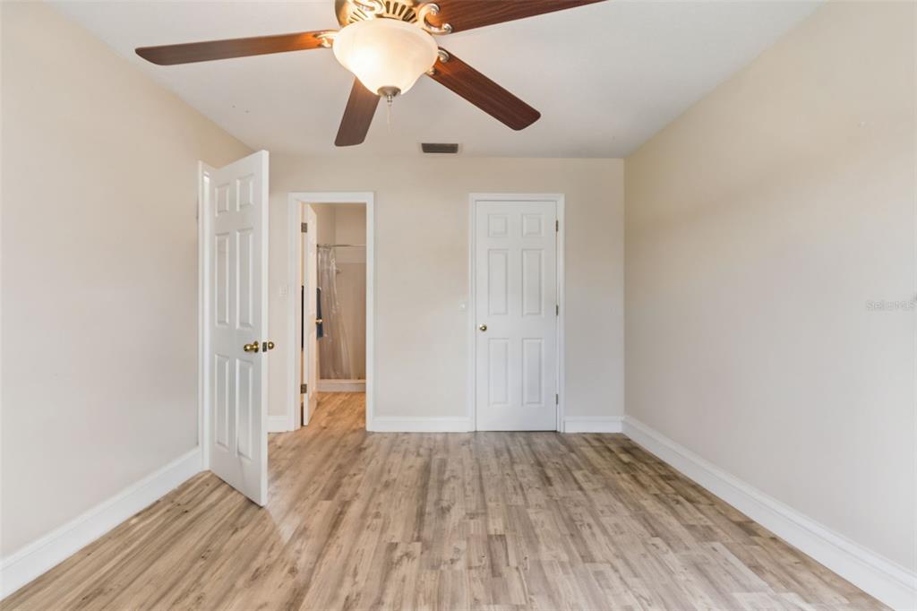 6026 Lilli Way Bradenton, FL 34207 - Photo 15 of 62 wooden floor in an empty room