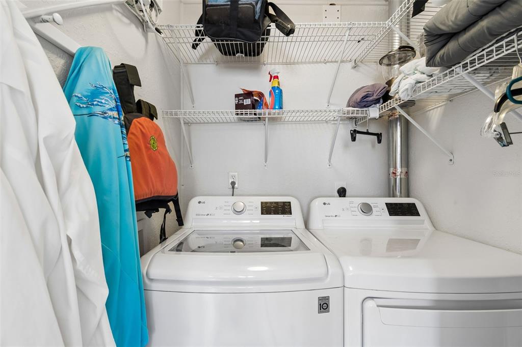 6026 Lilli Way Bradenton, FL 34207 - Photo 27 of 62 a utility room with dryer and washer