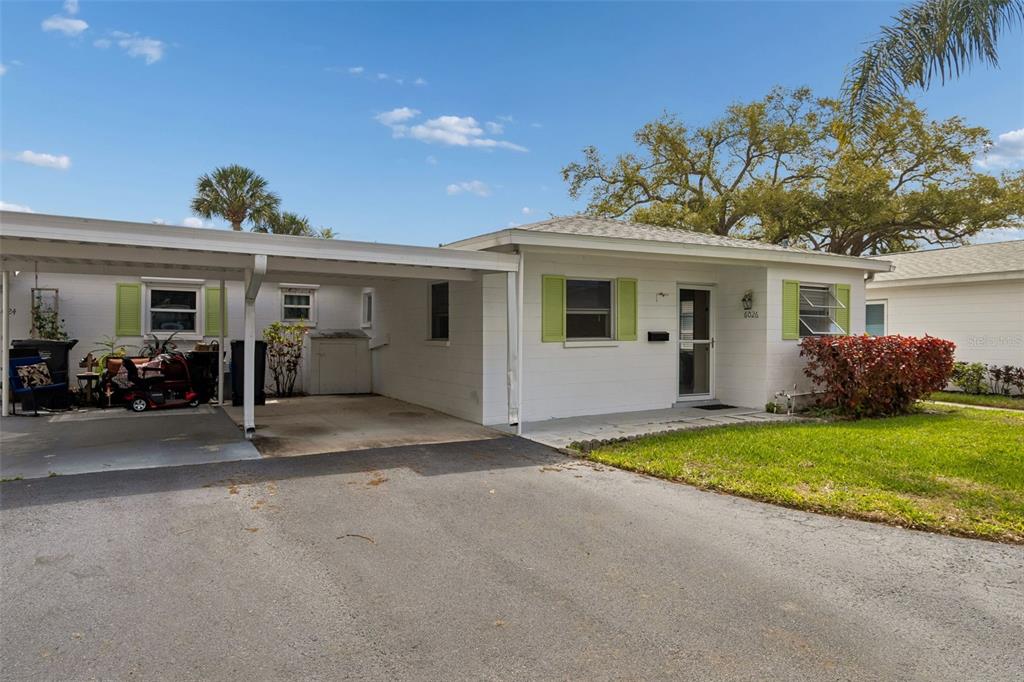 6026 Lilli Way Bradenton, FL 34207 - Photo 5 of 62 a view of a house with backyard space and garden