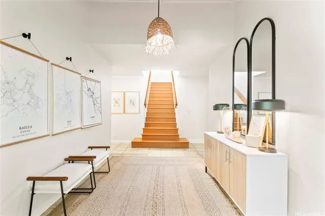 a view of a room with wooden floor and windows