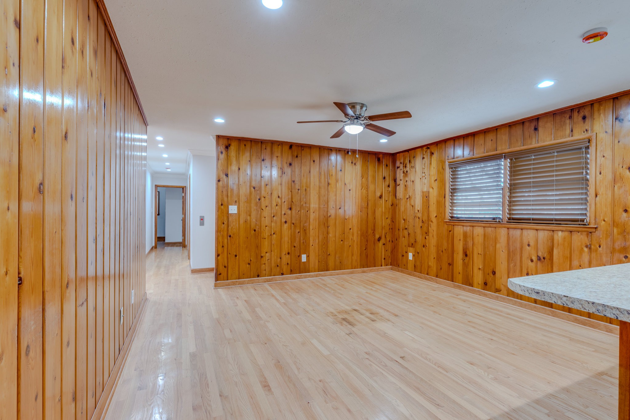 102 Sunset Drive Pulaski, TN 38478 - Photo 13 of 37 a view of an empty room with wooden floor and a window