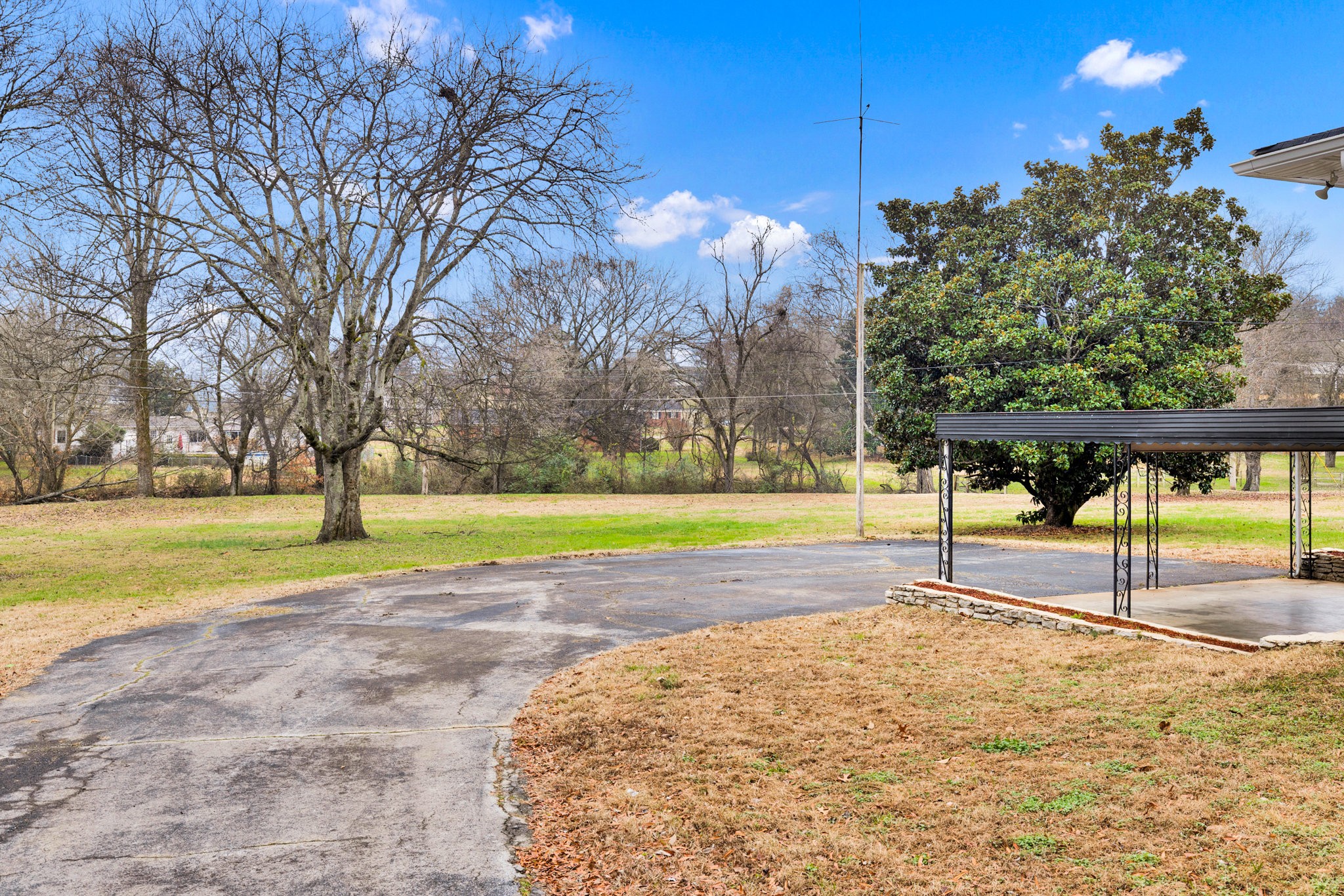 102 Sunset Drive Pulaski, TN 38478 - Photo 34 of 37 a view of a swimming pool with an outdoor space and seating area
