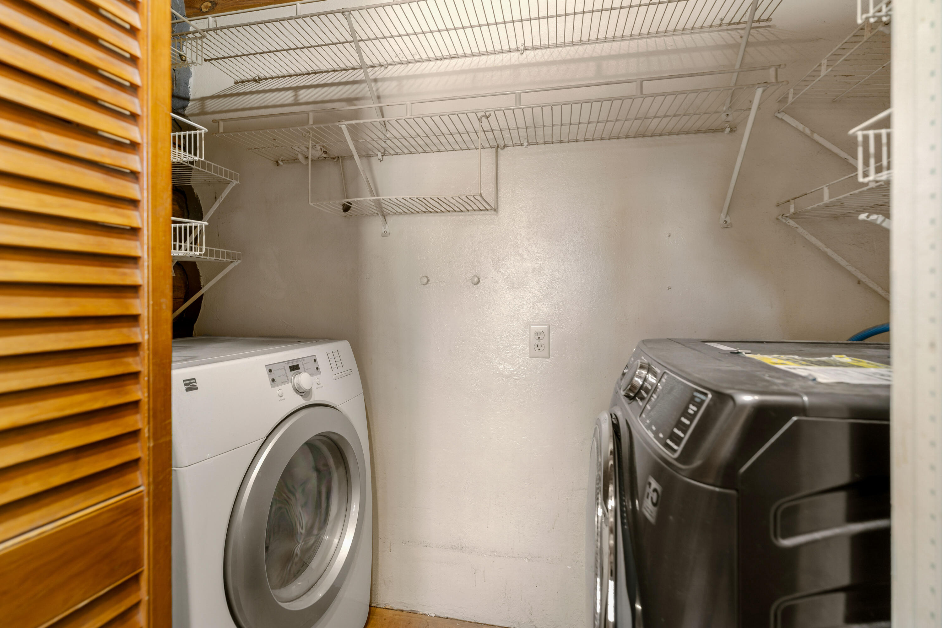 21910 Rickard Road Bend, OR 97702 - Photo 42 of 42 a utility room with dryer and washer
