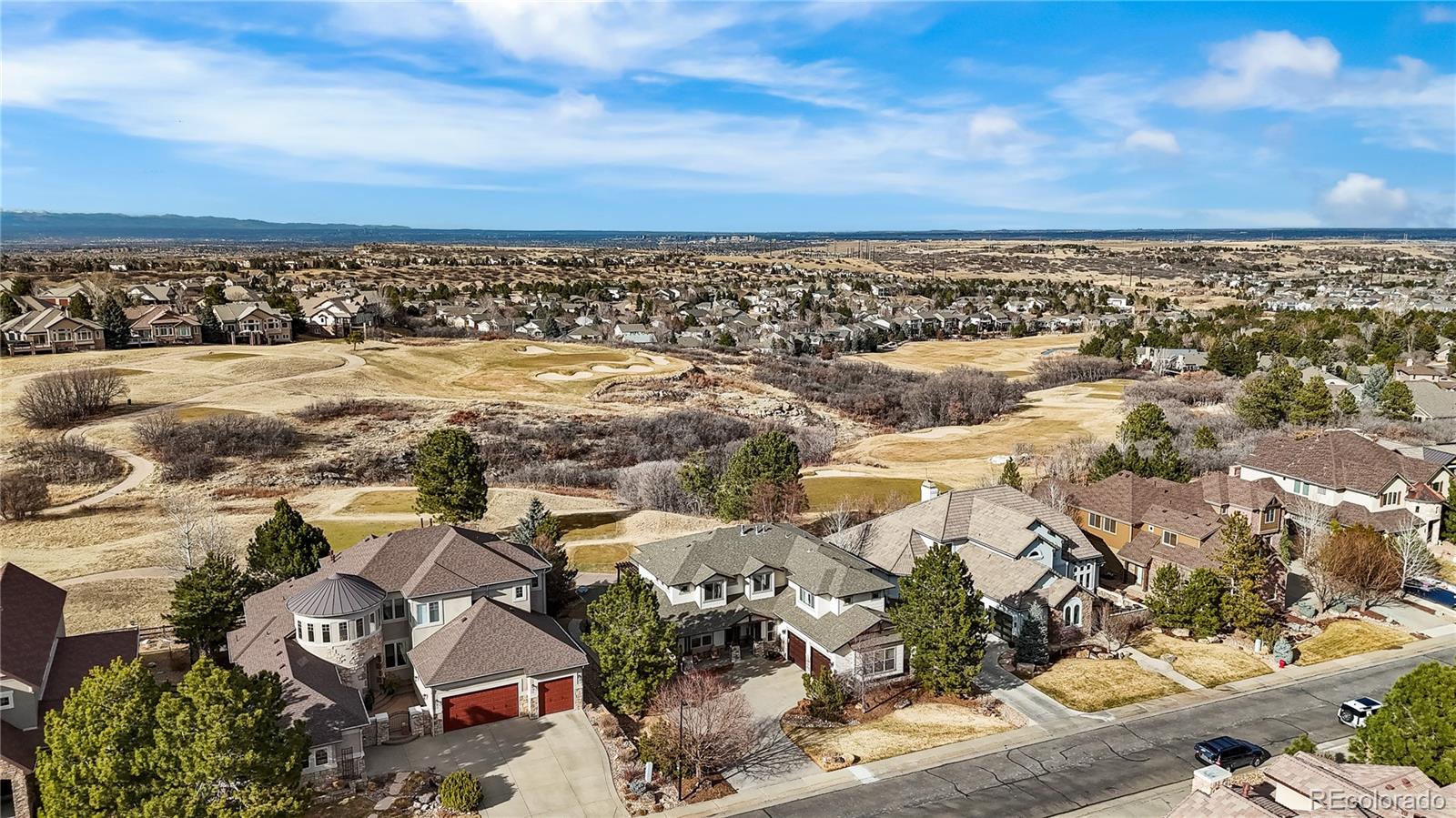 1251 Buffalo Ridge Road Castle Pines, CO 80108 - Photo 3 of 50 an aerial view of multiple house
