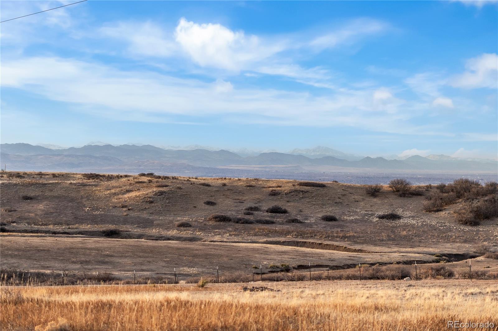 1251 Buffalo Ridge Road Castle Pines, CO 80108 - Photo 47 of 50 a view of ocean and mountain