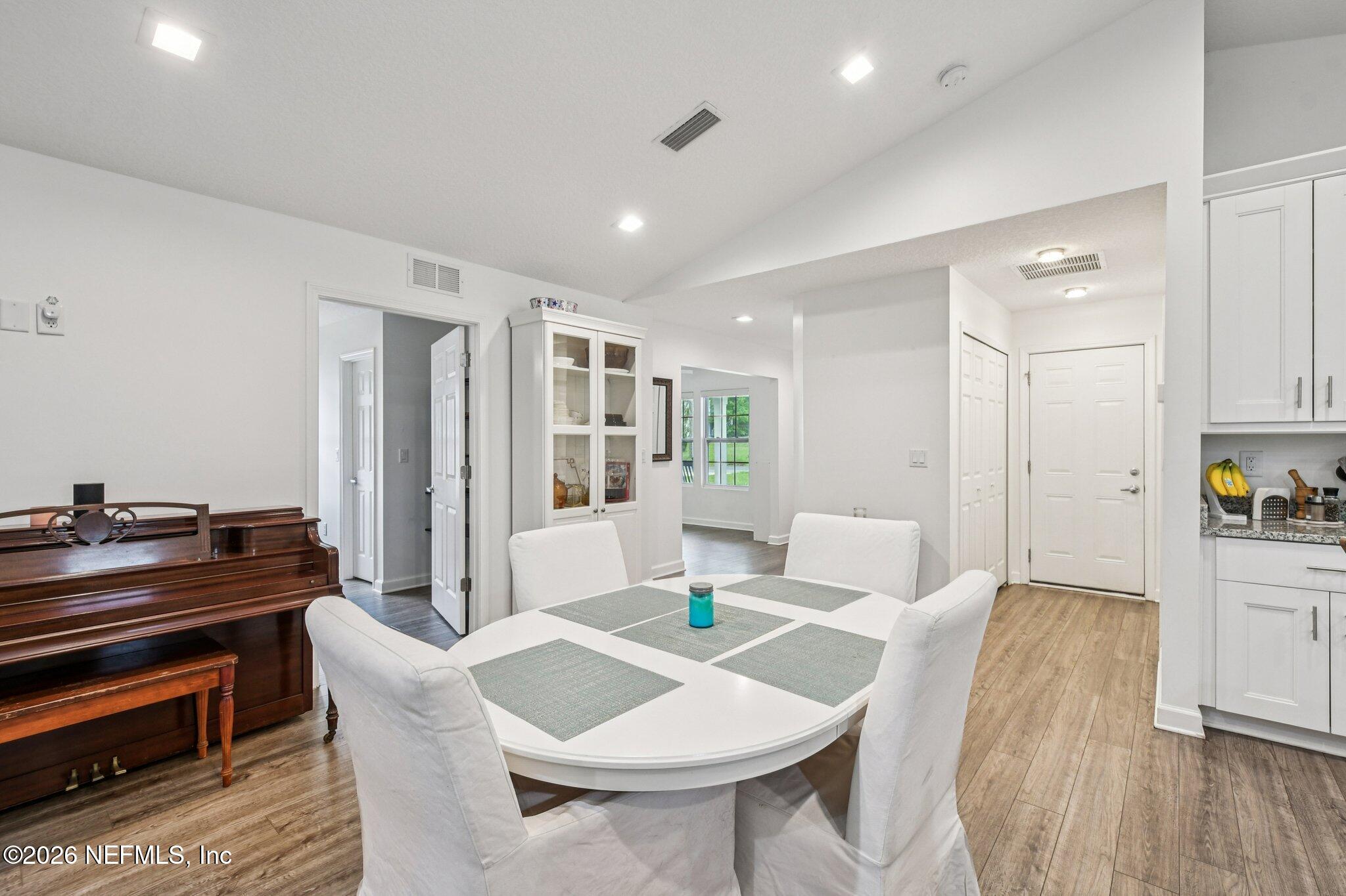 4183 Pine Road Orange Park, FL 32065 - Photo 14 of 62 a living room with furniture and a table