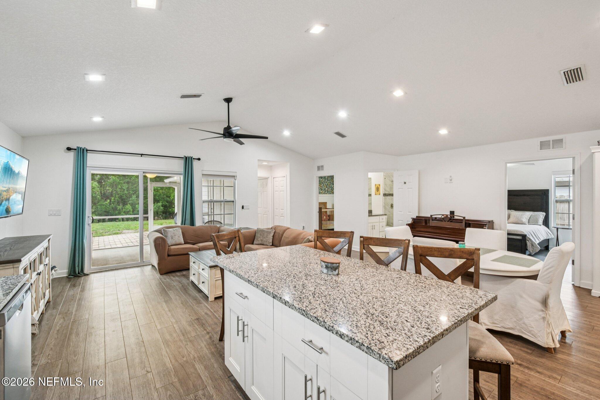 4183 Pine Road Orange Park, FL 32065 - Photo 18 of 62 a living room with furniture and a flat screen tv