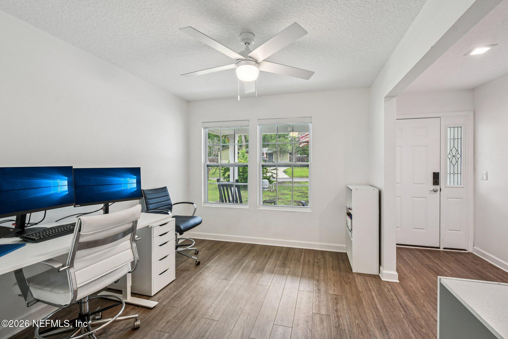 4183 Pine Road Orange Park, FL 32065 - Photo 26 of 62 a living room with furniture and a wooden floor